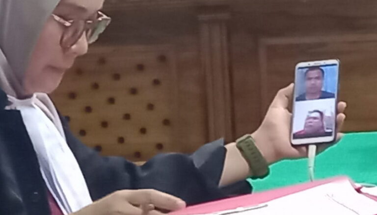 'Nekat' membuat postingan audio (suara) bermuatan penistaan/penodaan agama di akun media sosial (medsos) Tiktok, Rudi Simamora (34), Selasa petang (10/1/2023), menjalani persidangan secara virtual di Ruang Kartika PN Medan.